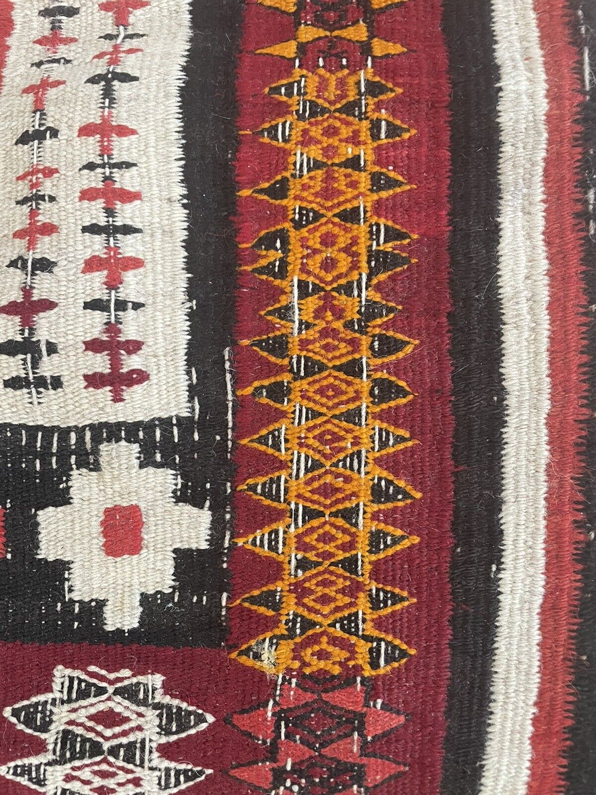 Close-up of geometric shapes on Handmade Antique Moroccan Berber Kilim Rug - Detailed view showcasing the geometric shapes and patterns surrounding the camel motif, creating a harmonious composition.