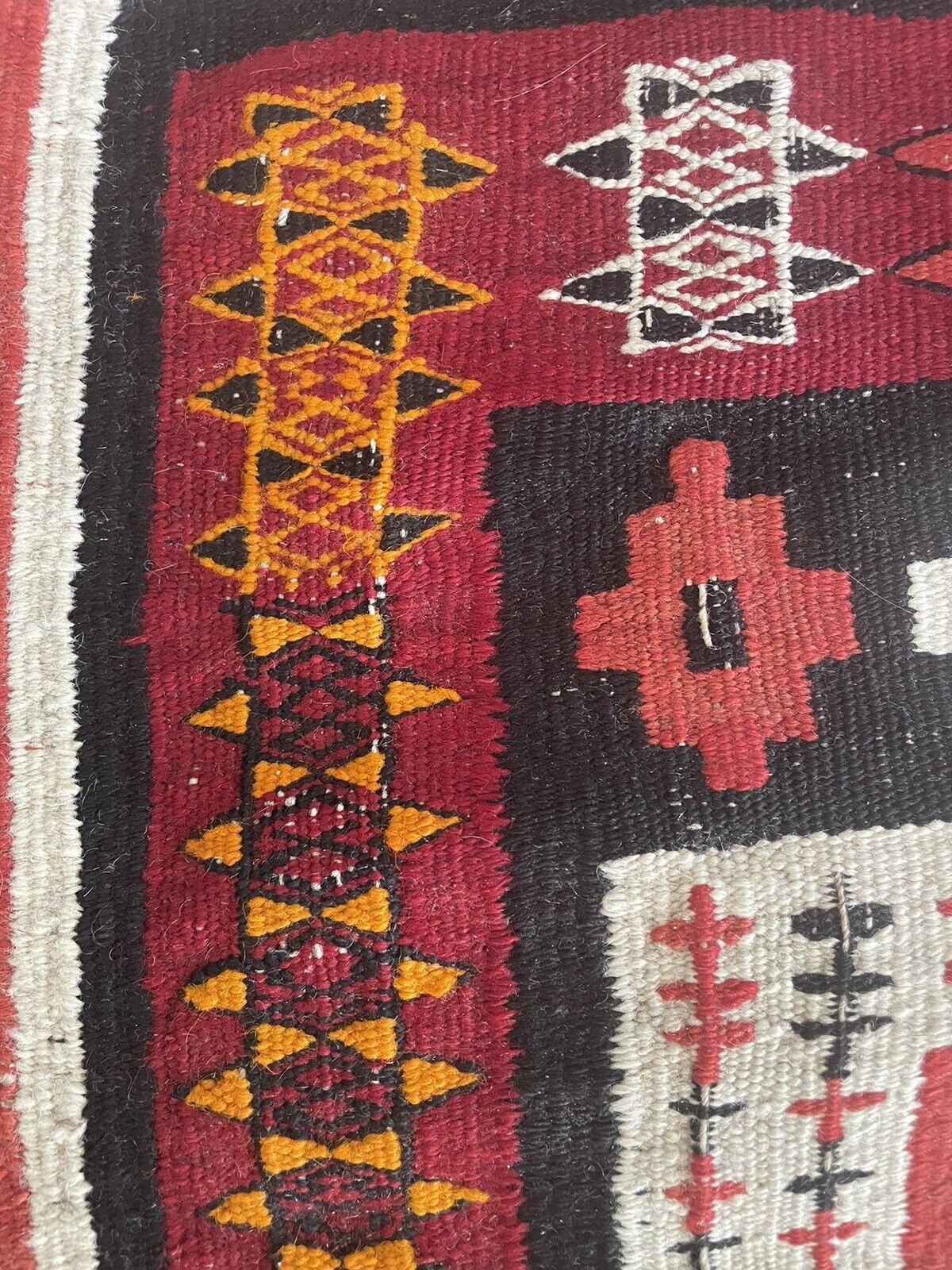 Close-up of age wear on Handmade Antique Moroccan Berber Kilim Rug - Detailed view showing signs of age wear, adding to the rug's authenticity and character.