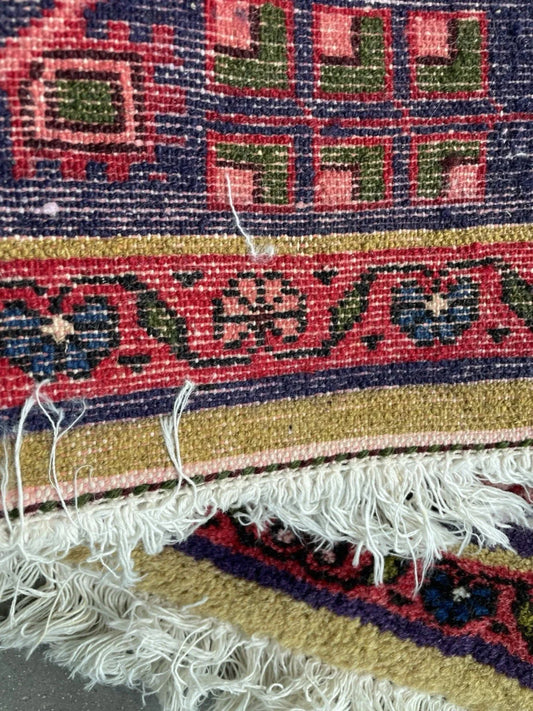 Stepped geometric medallions in earth tones