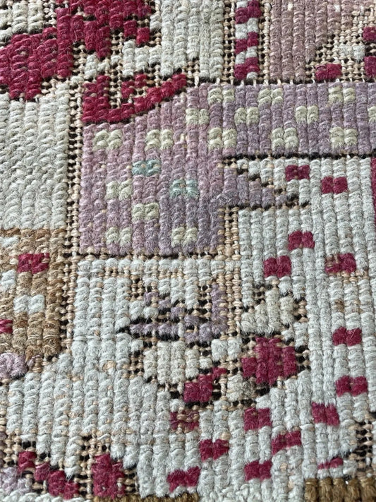 Traditional prayer niche on crimson red field