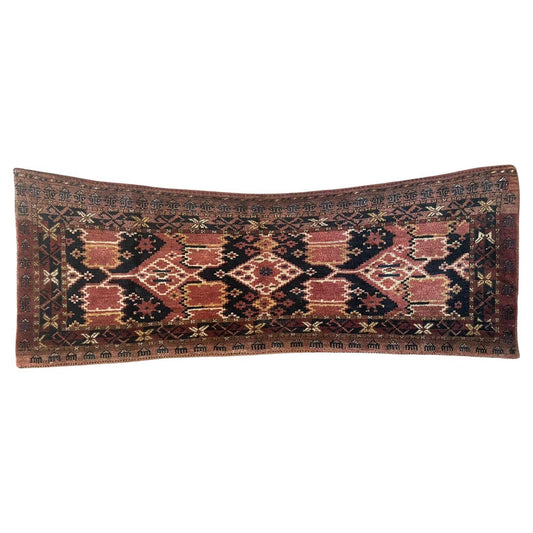 Handmade Antique Afghan Beshir Collectible Chuval Rug - 1900s - Rectangular chuval rug featuring intricate designs and patterns woven into its woolen texture.