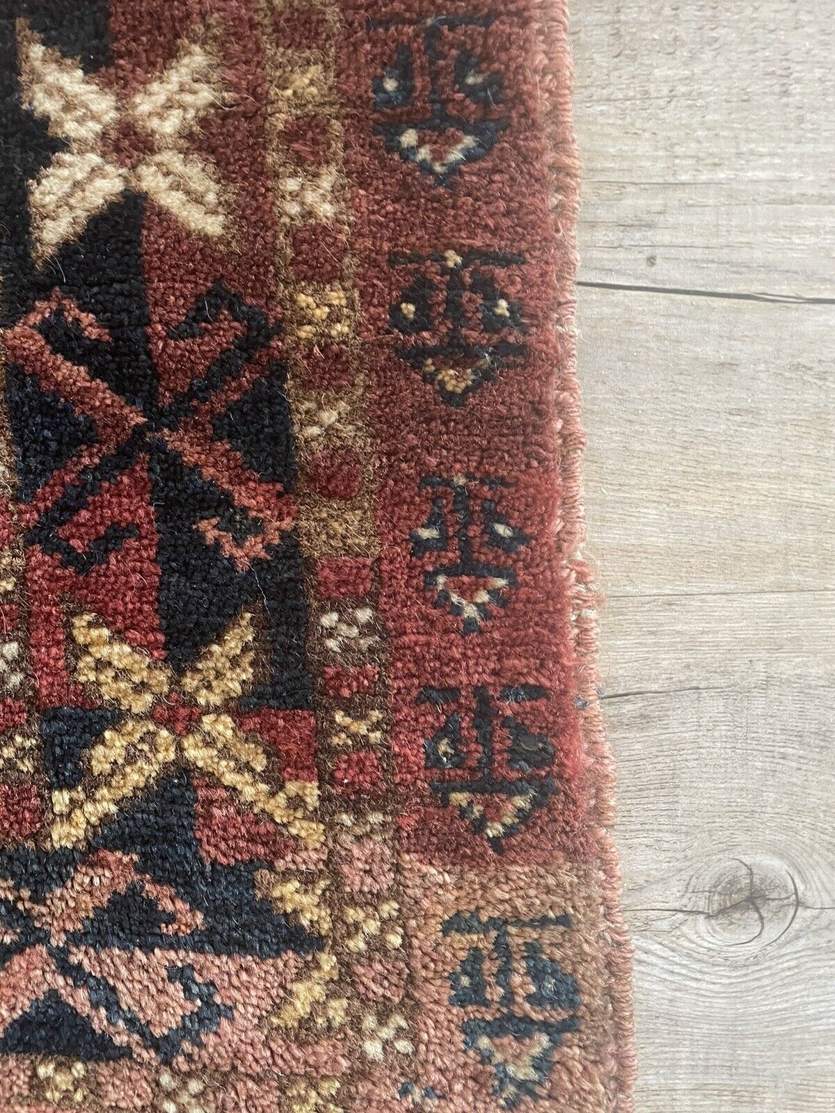 Close-up of woolen texture on Handmade Antique Afghan Beshir Collectible Chuval Rug - Detailed view emphasizing the woolen texture of the rug, adding to its authenticity and cultural significance.