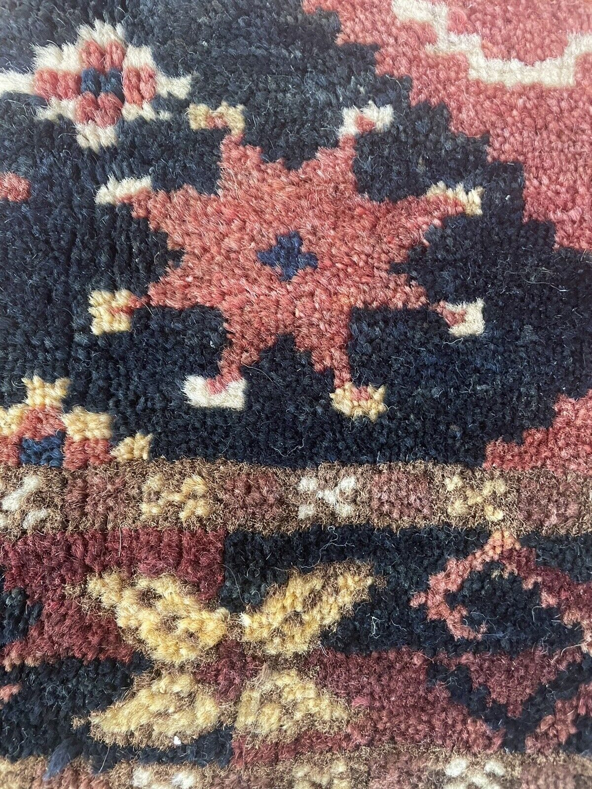 Close-up of authenticity on Handmade Antique Afghan Beshir Collectible Chuval Rug - Detailed view highlighting the rug's authenticity as a collectible piece cherished for its historical significance and craftsmanship.