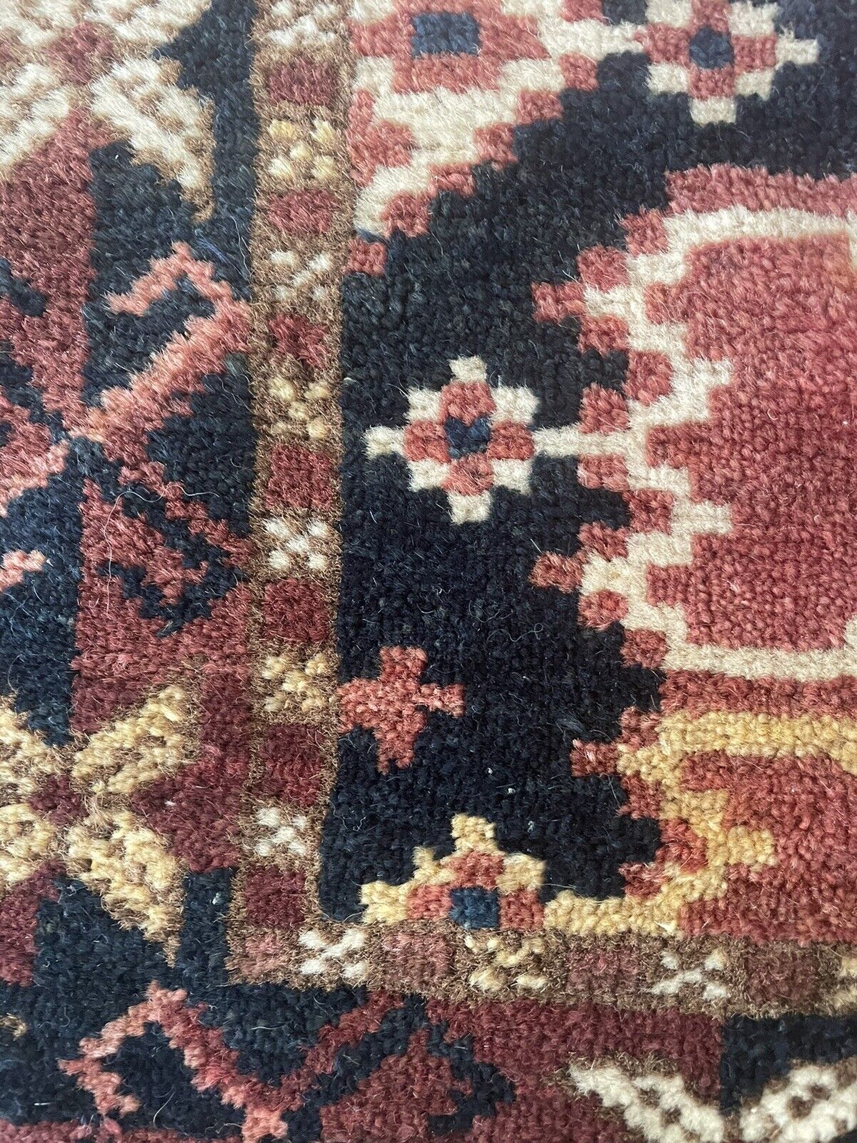 Close-up of character on Handmade Antique Afghan Beshir Collectible Chuval Rug - Detailed view showcasing the rug's character and charm, shaped by its age wear and unique design.