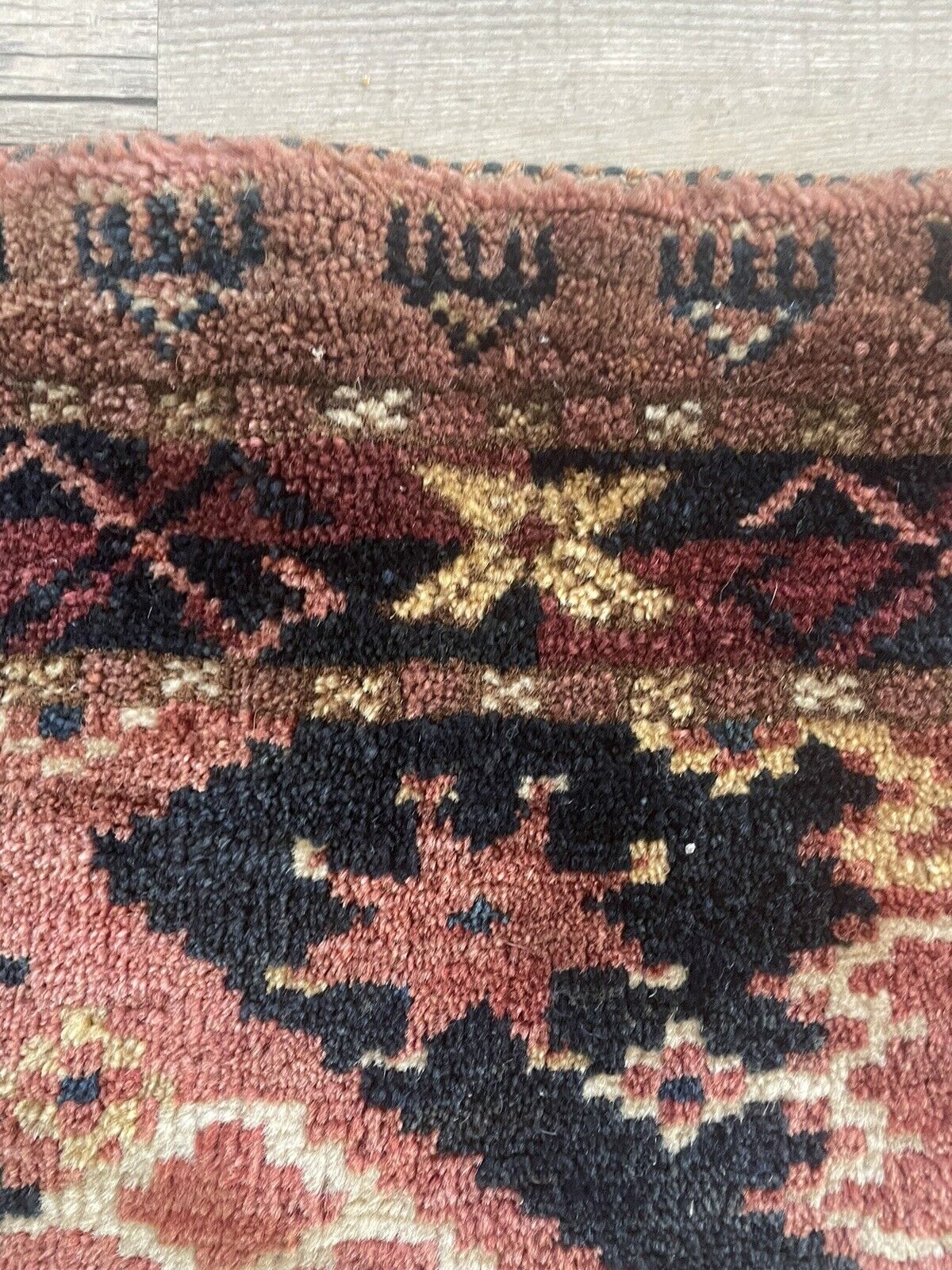Close-up of intricate designs on Handmade Antique Afghan Beshir Collectible Chuval Rug - Detailed view showcasing the intricate designs and patterns woven into the rug's surface, reflecting the rich cultural heritage of Afghanistan.
