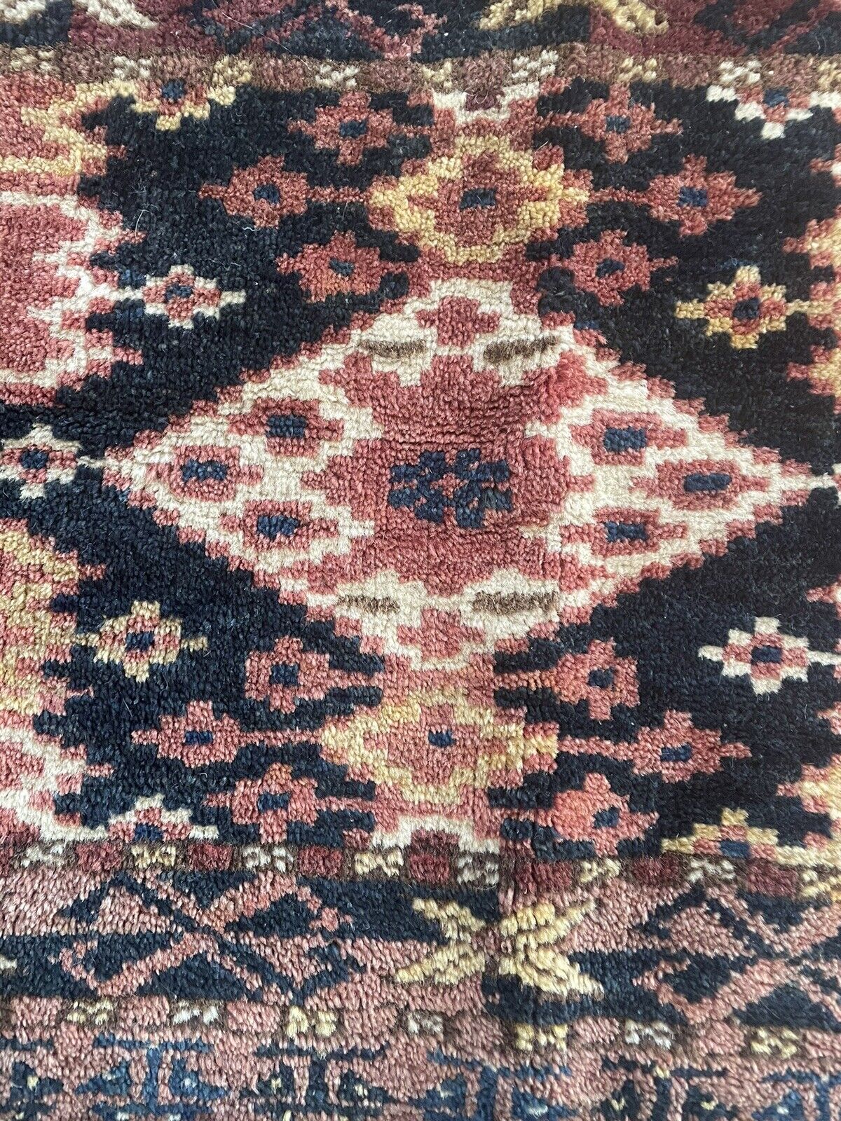 Close-up of historical significance on Handmade Antique Afghan Beshir Collectible Chuval Rug - Detailed view emphasizing the rug's historical significance as a rare gem from the 1900s, carrying the spirit of its origin and cultural heritage.