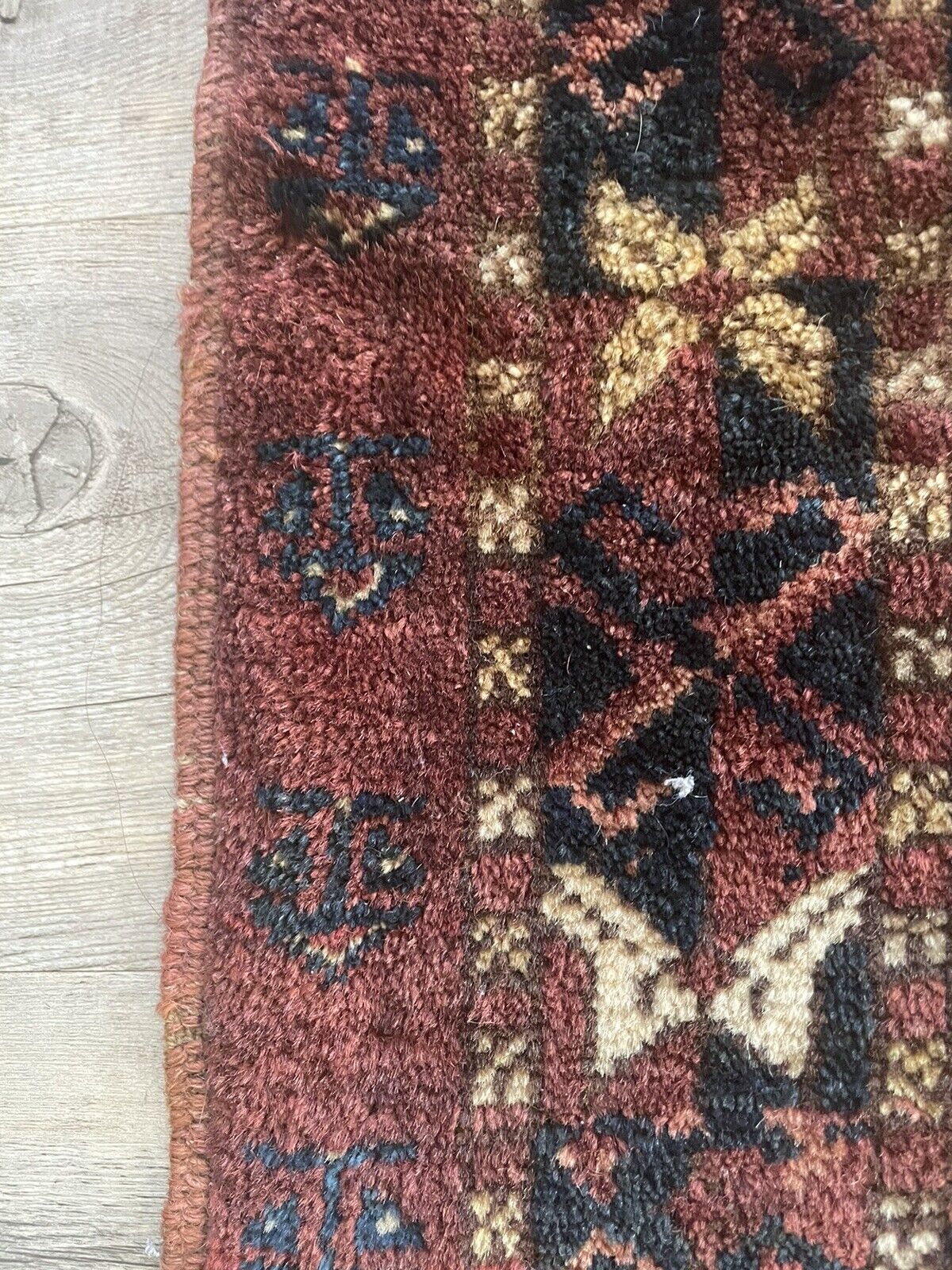 Close-up of geometric shapes on Handmade Antique Afghan Beshir Collectible Chuval Rug - Detailed view highlighting the geometric shapes and symmetrical motifs adorning the rug's surface, adding to its aesthetic appeal.