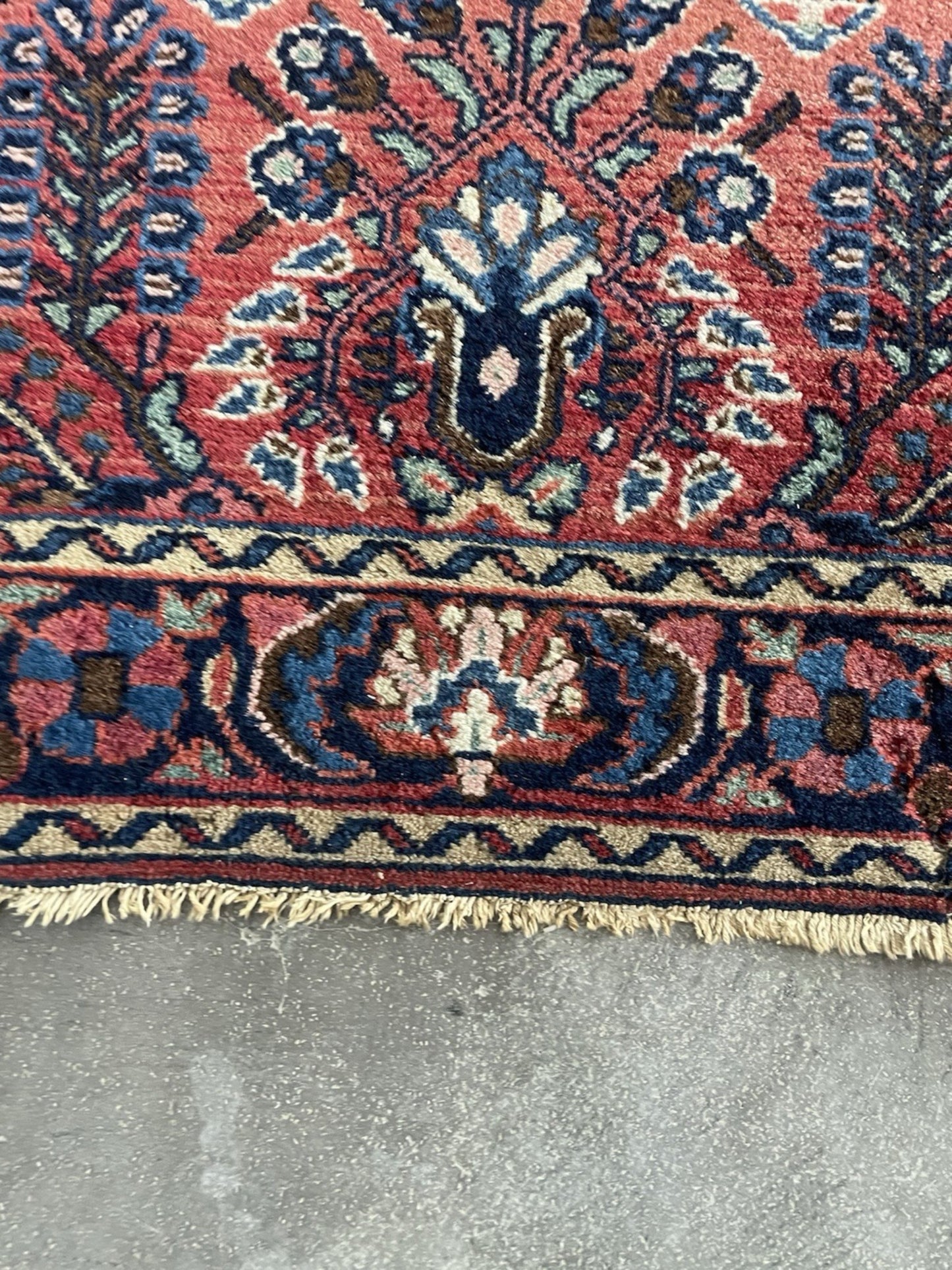 The back of the rug revealing the fine, consistent knotting.