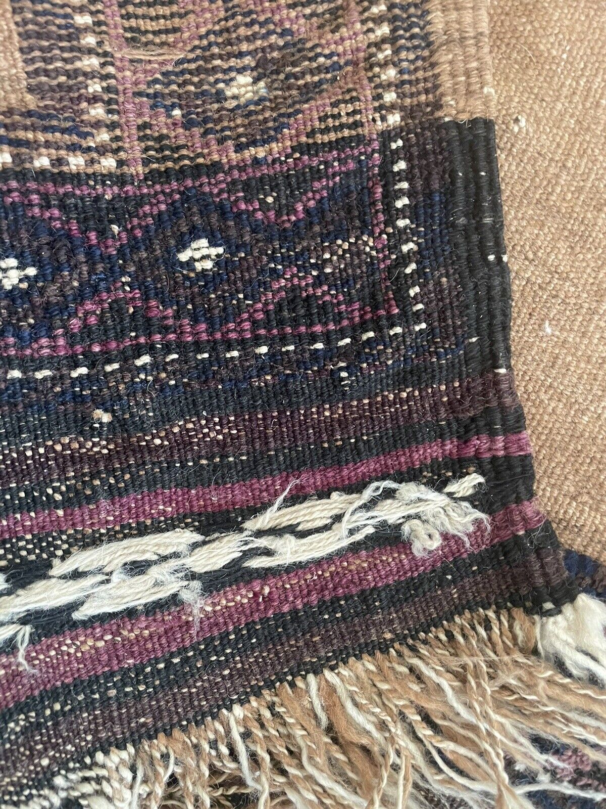 Back side of the Handmade Antique Afghan Baluch Collectible Rug - Underside view revealing the rug's construction and material.