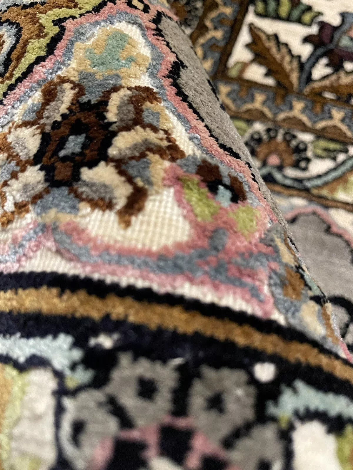 Intricate Persian Carpet with Floral & Geometric Designs