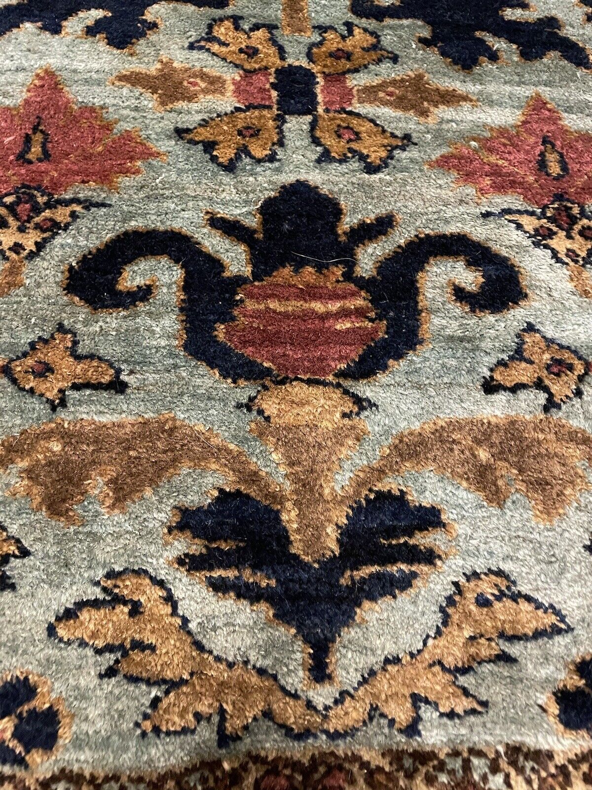 Handwoven Antique Wool Rug with Traditional Persian Designs