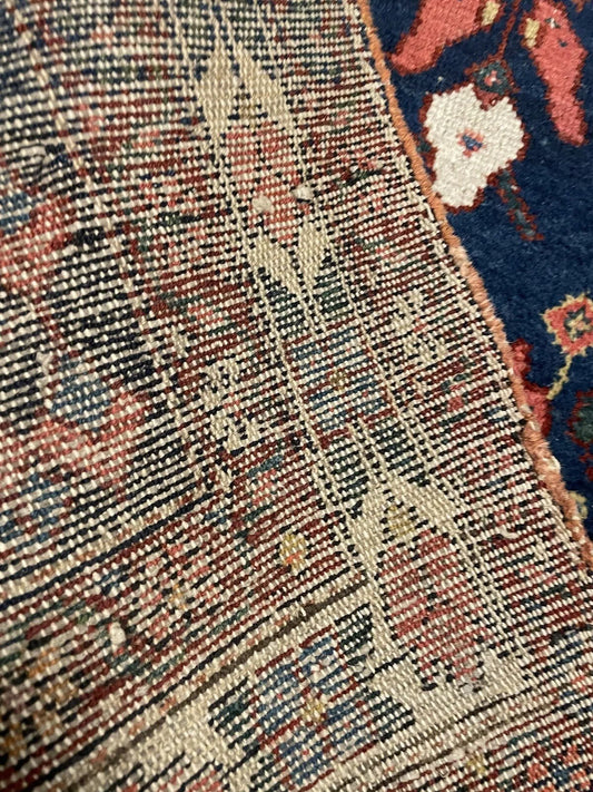 Vintage Bakhtiari rug with intricate floral and geometric patterns