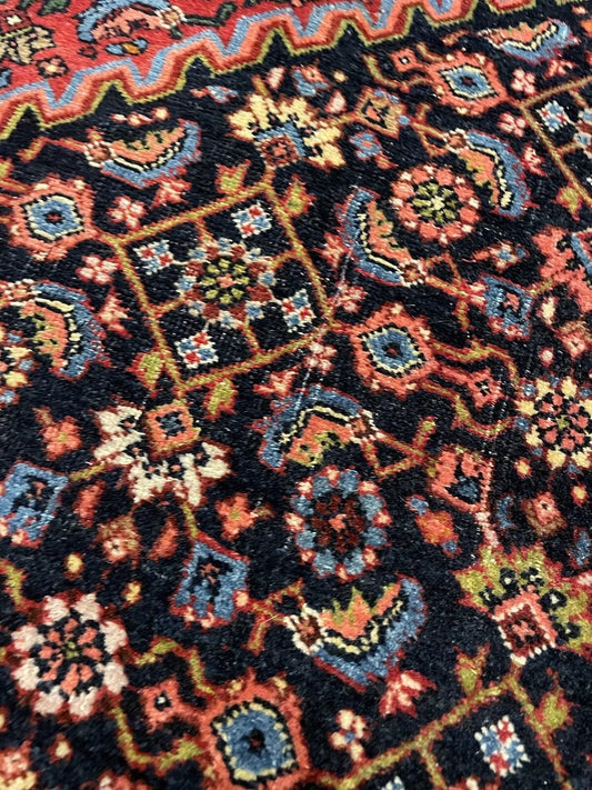 Close-up of intricate medallion design on a Bidjar wool rug
