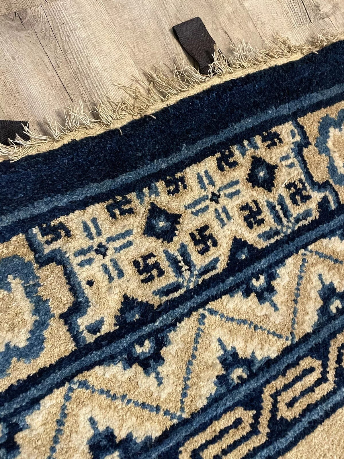 Blue and beige color palette on an antique Peking carpet