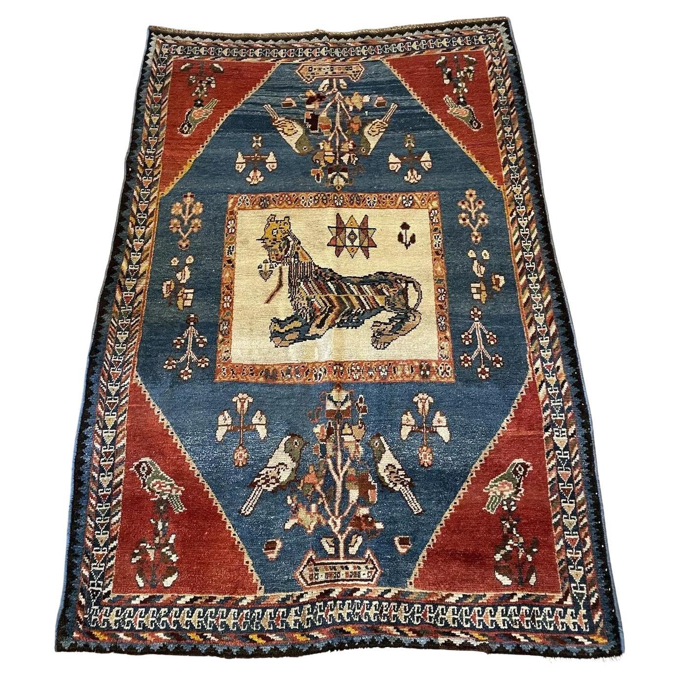 Handmade antique Gabbeh wool rug from the 1910s, 4.9' x 7.2'
