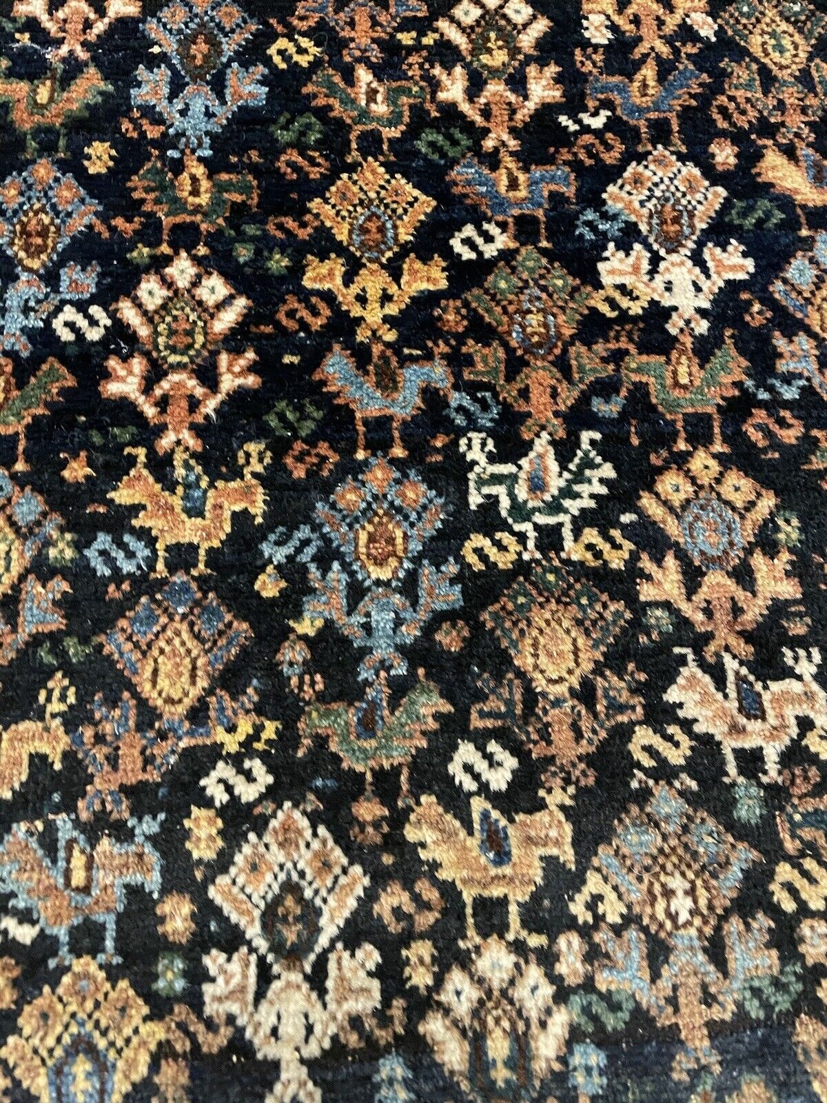 Soft wool texture of an antique Afshar rug