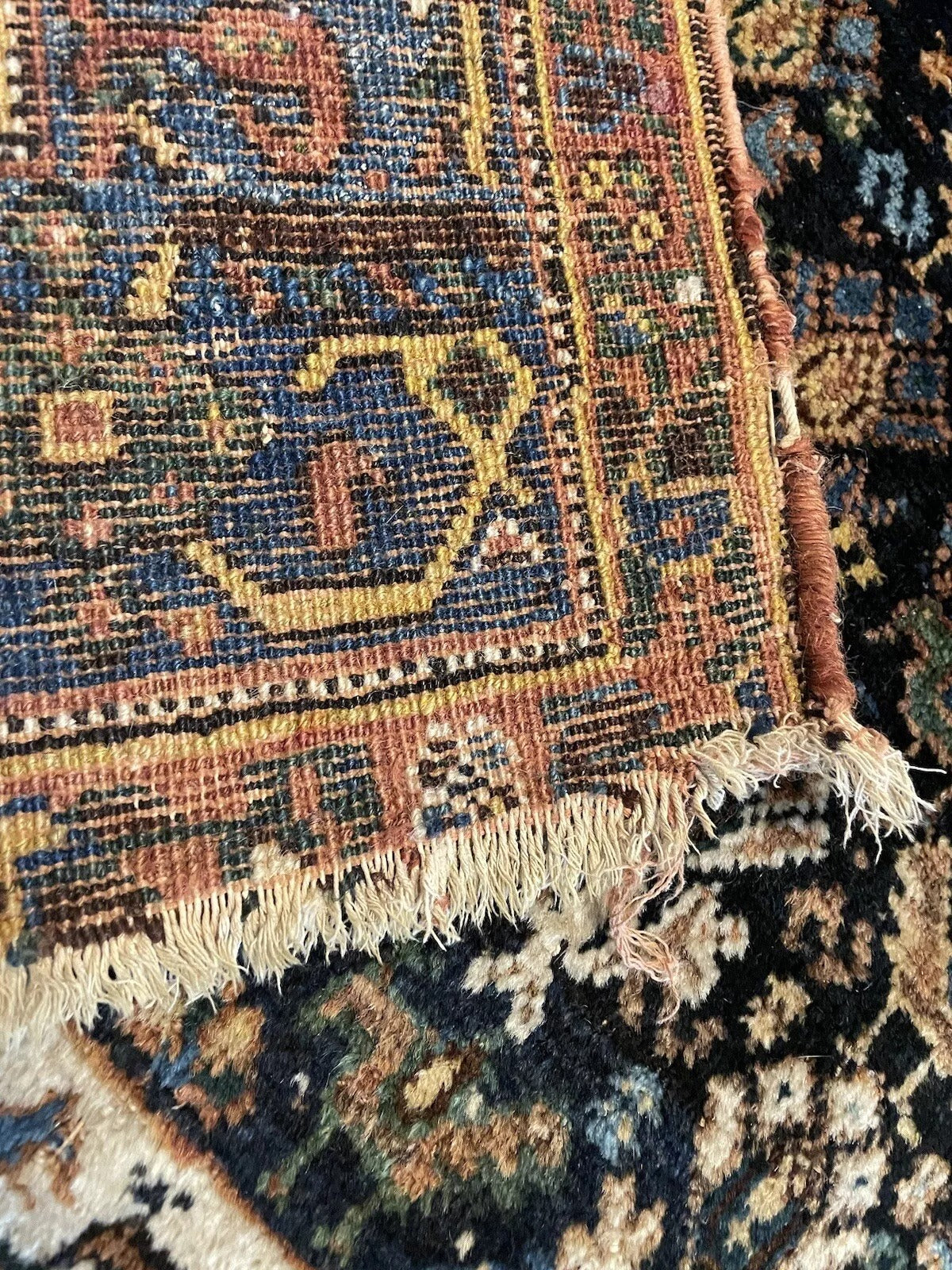 Classic geometric and floral details on a well-preserved Afshar rug