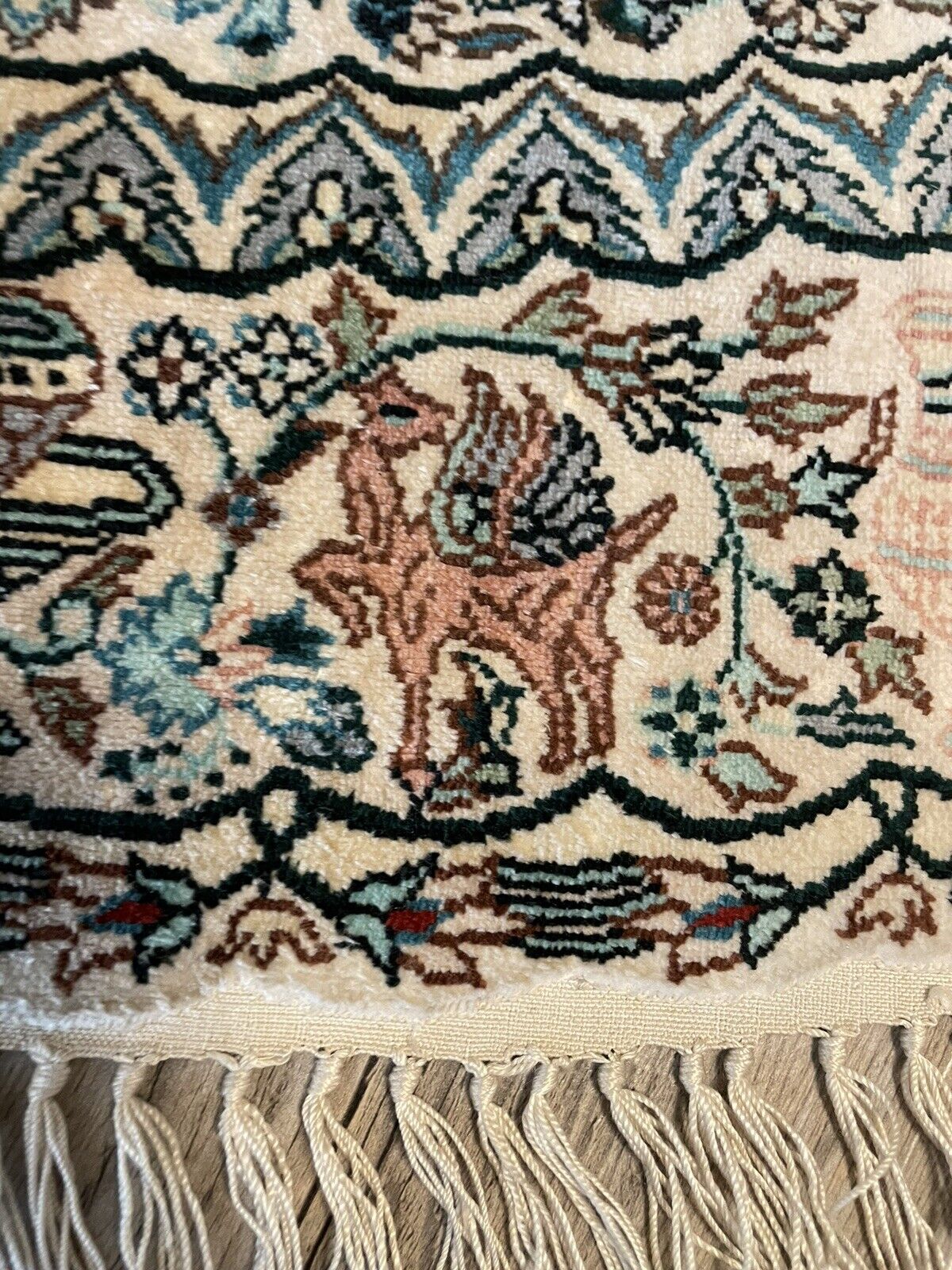 Luxury silk rug with detailed geometric and floral patterns