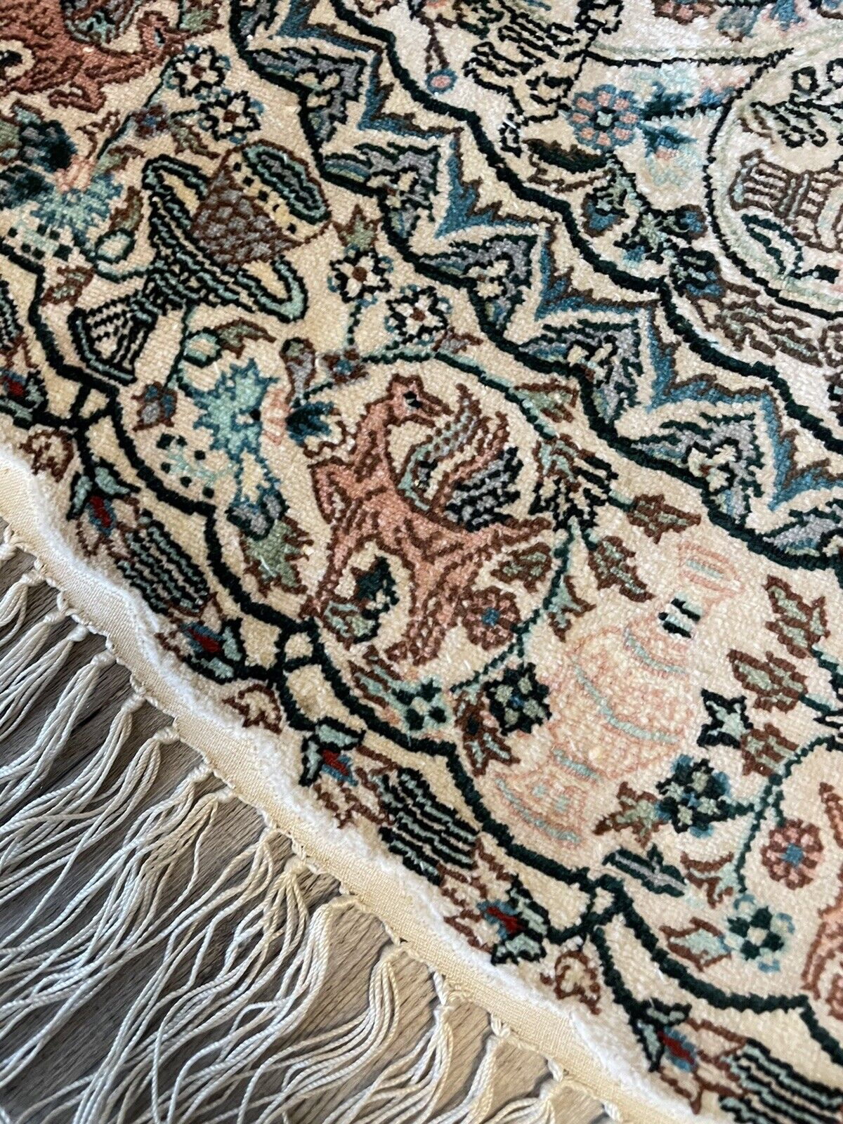 Handwoven Tabriz silk carpet with a luminous finish