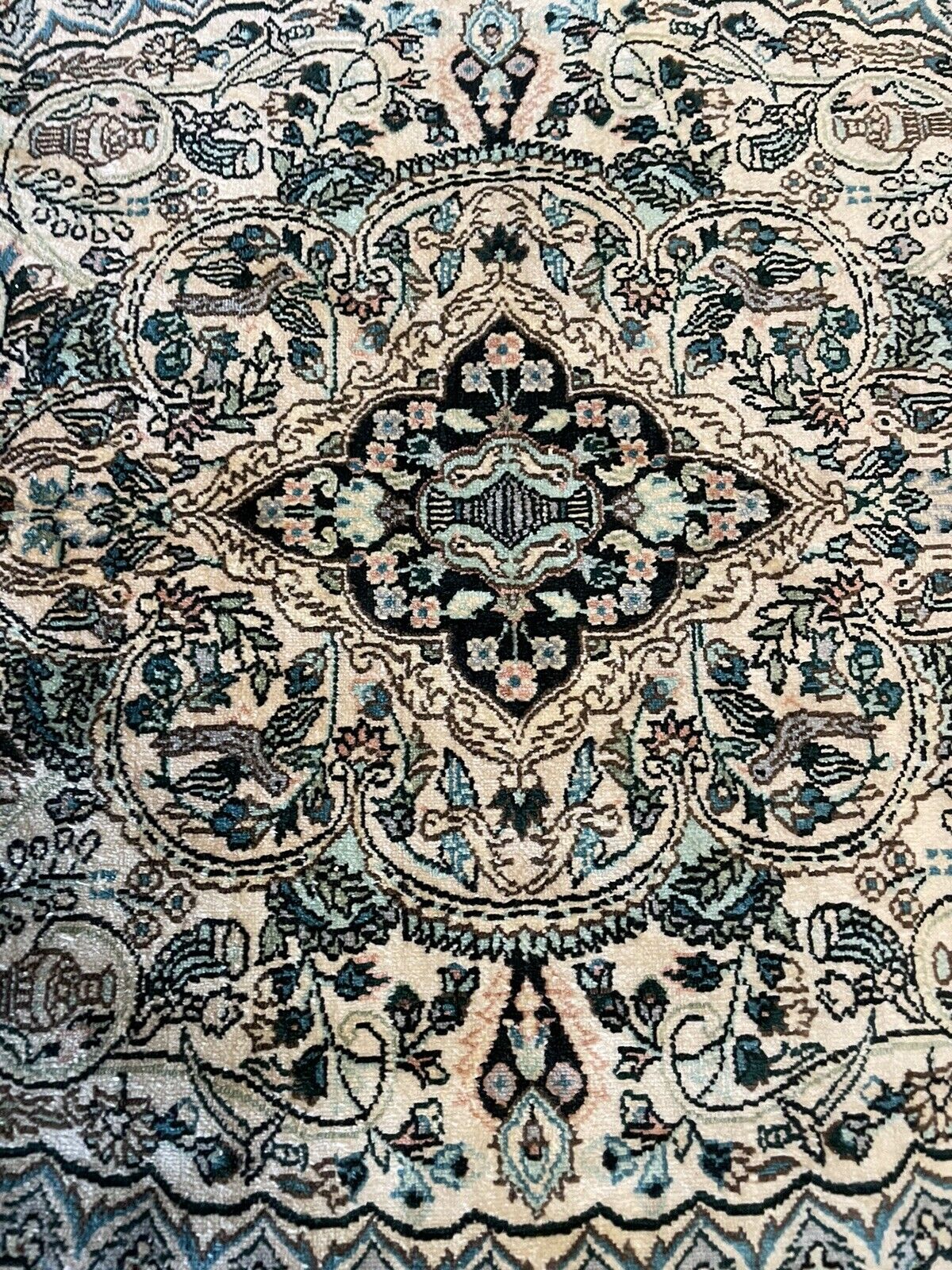 Silk-on-silk handwoven carpet with delicate craftsmanship