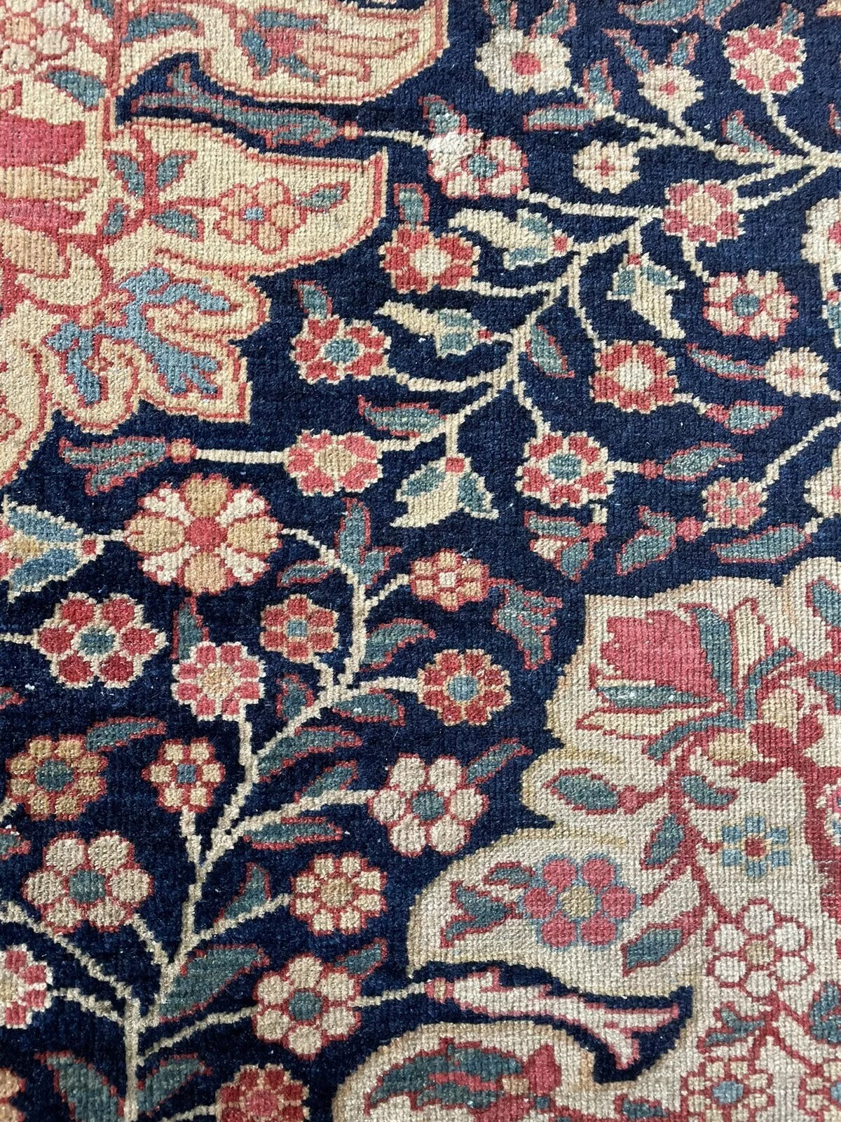 Handwoven wool rug featuring traditional Middle Eastern craftsmanship