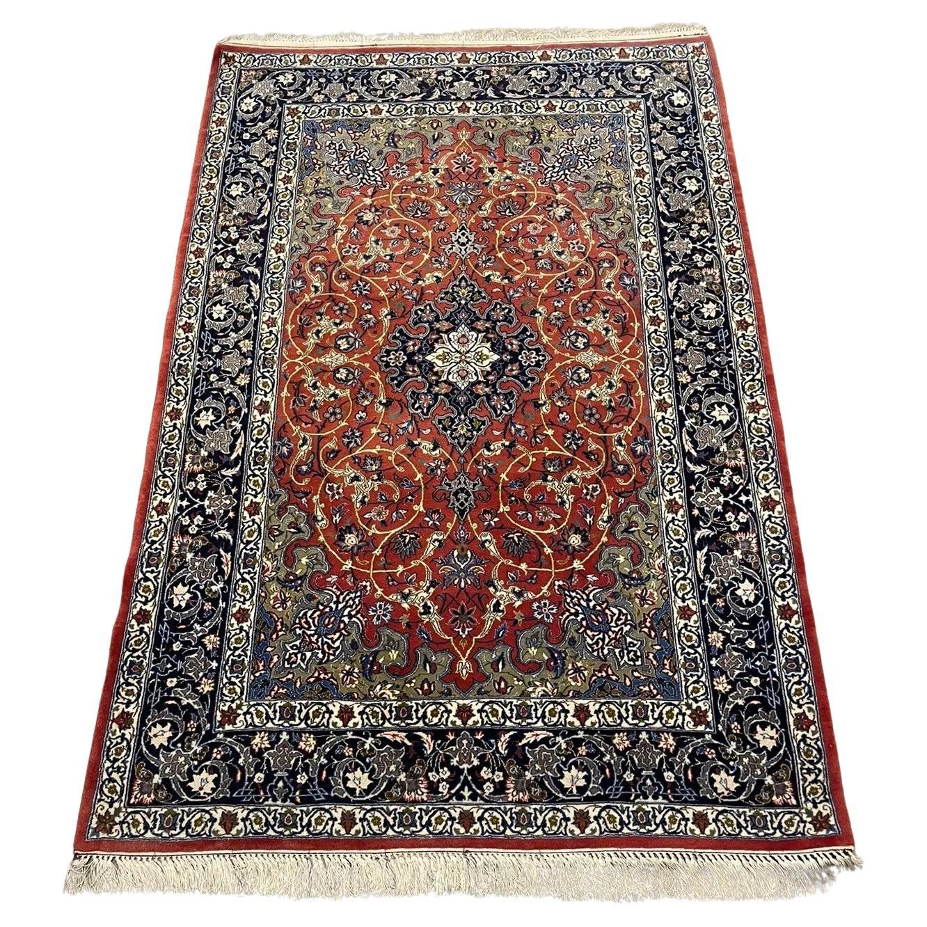 Handmade vintage Persian Isfahan wool and silk rug from the 1970s
