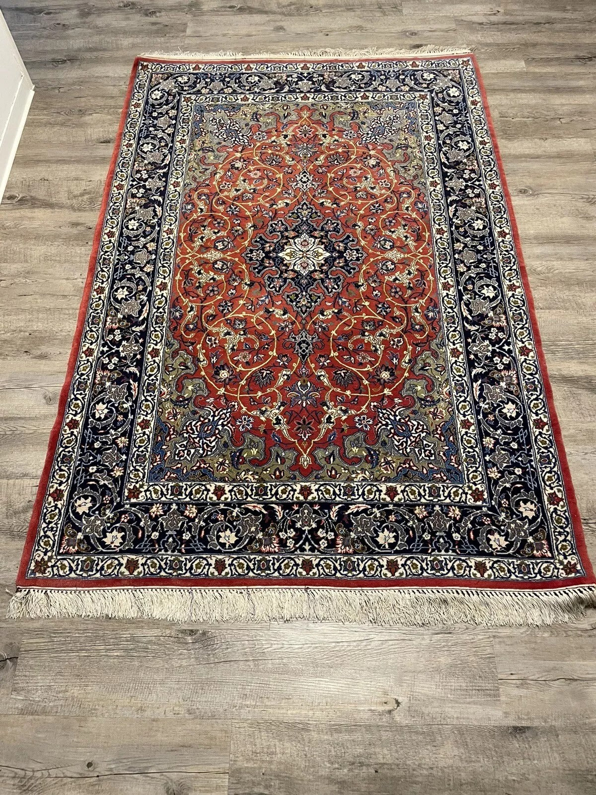 Red and blue vintage Isfahan rug with silk highlights