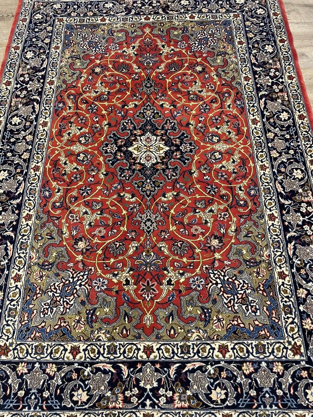Vintage Persian carpet with a rich color palette of red, blue, and green