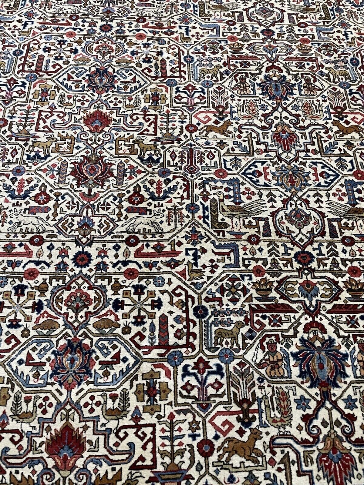 Fine Persian carpet with floral borders and a detailed medallion