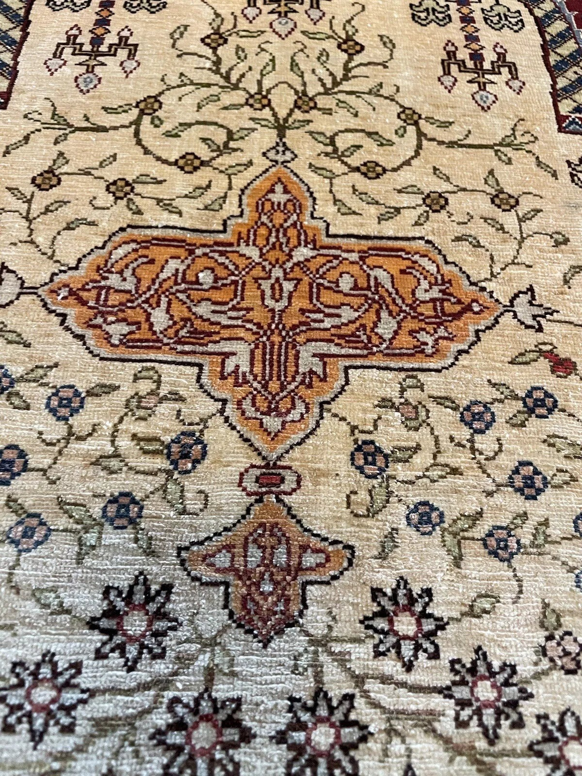 Luxury silk Turkish Hereke rug with finely knotted craftsmanship