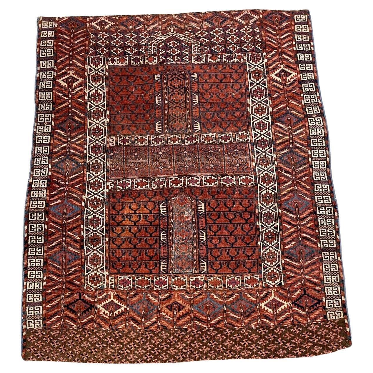 Handmade antique Turkmen Engsi rug from the 1880s