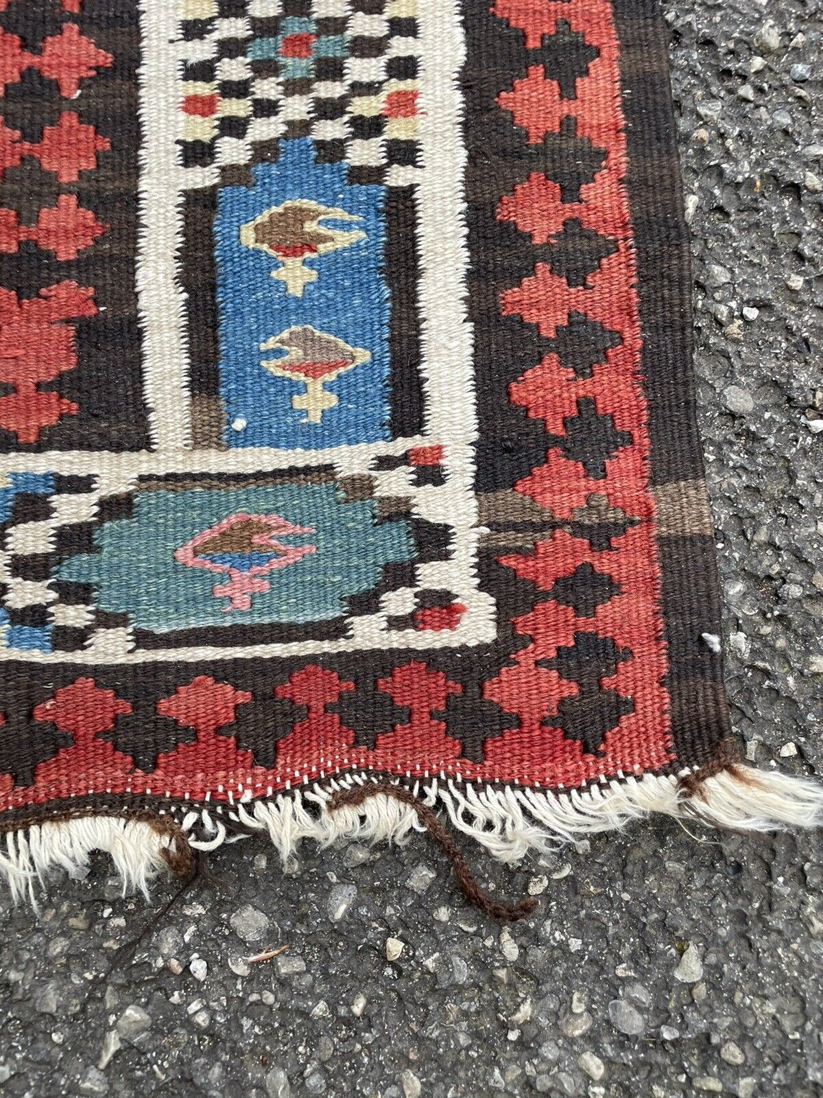 Traditional tribal patterns on a handmade vintage wool runner