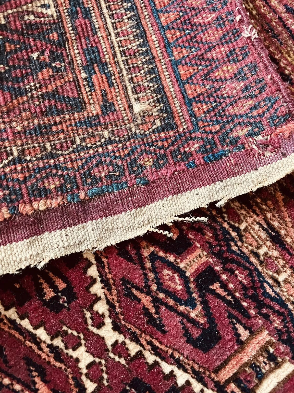 Unique antique wool rug featuring Turkmen tribal artistry