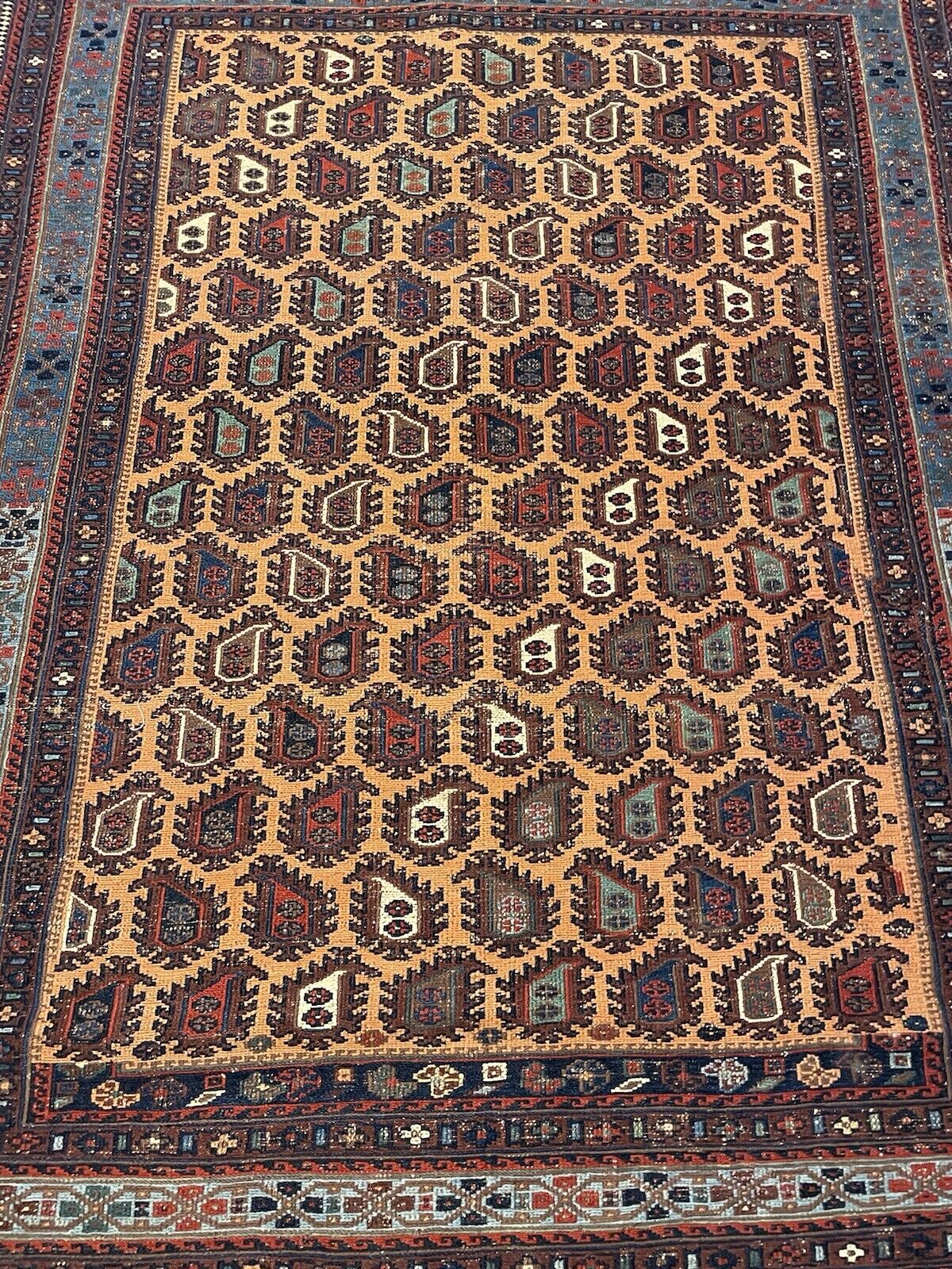 Close-up of fine Afghan tribal weaving with detailed motifs