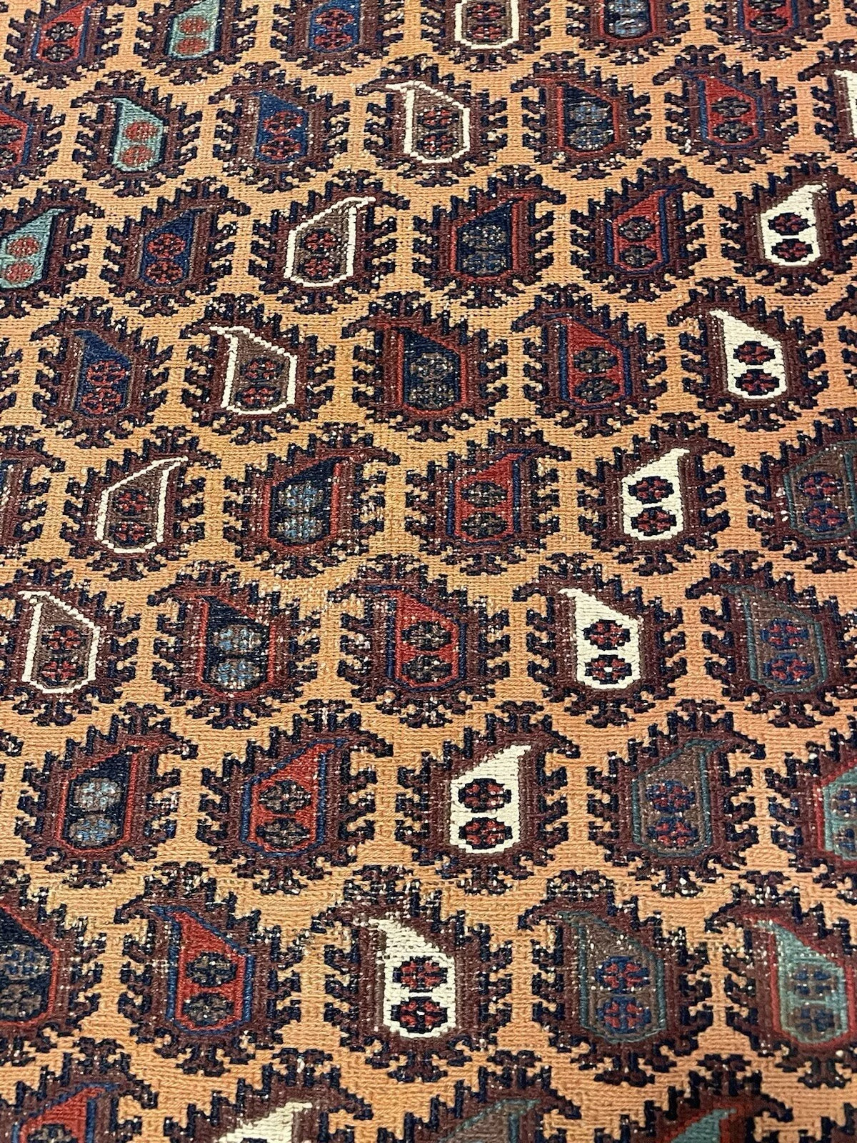 Rich red and blue hues in a 1920s Sumak flatweave wool rug