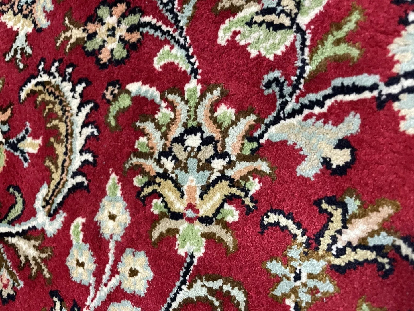 Shimmering silk texture of Qum rug weave