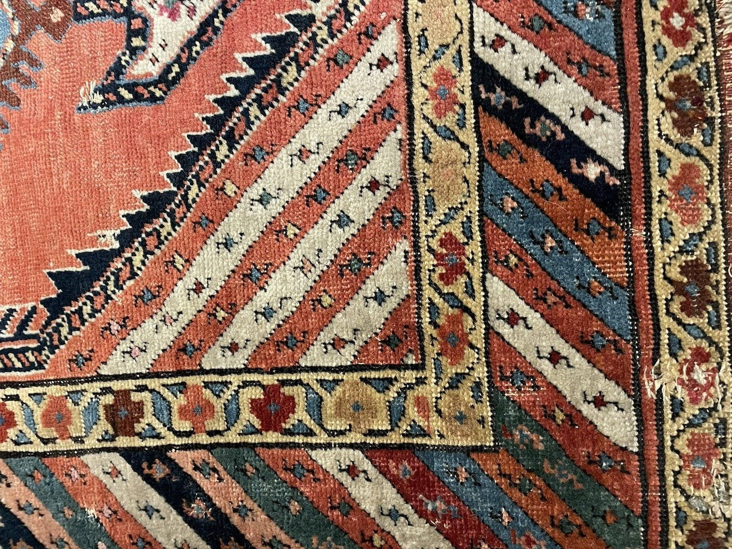 Artisan weaving detail in Kurdish rug showing knotting