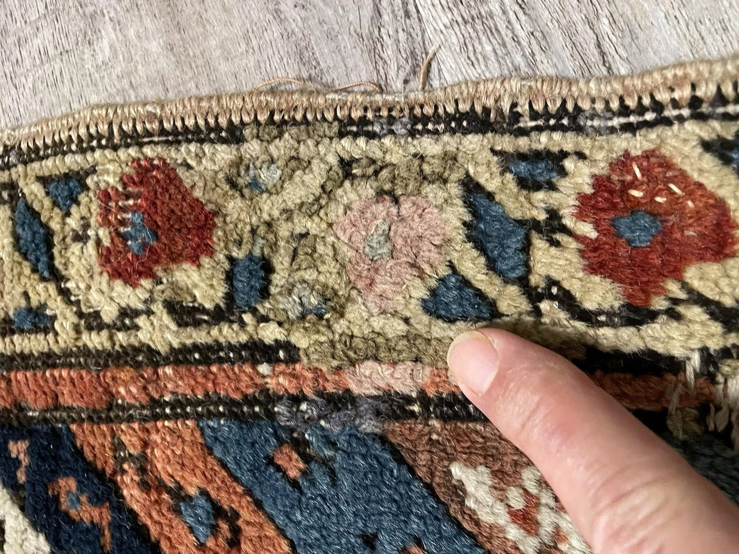 Tribal medallion motif in antique Persian Kurdish runner