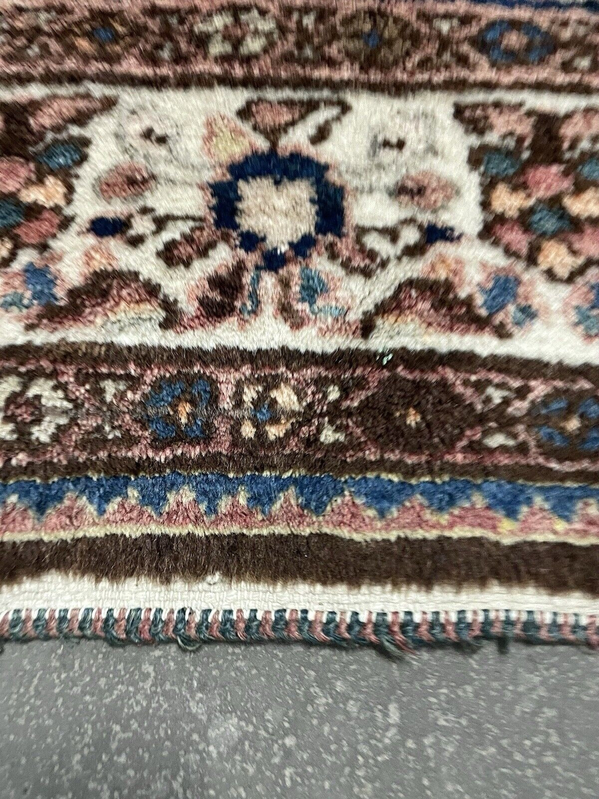 Handwoven Persian wool rug with traditional pattern