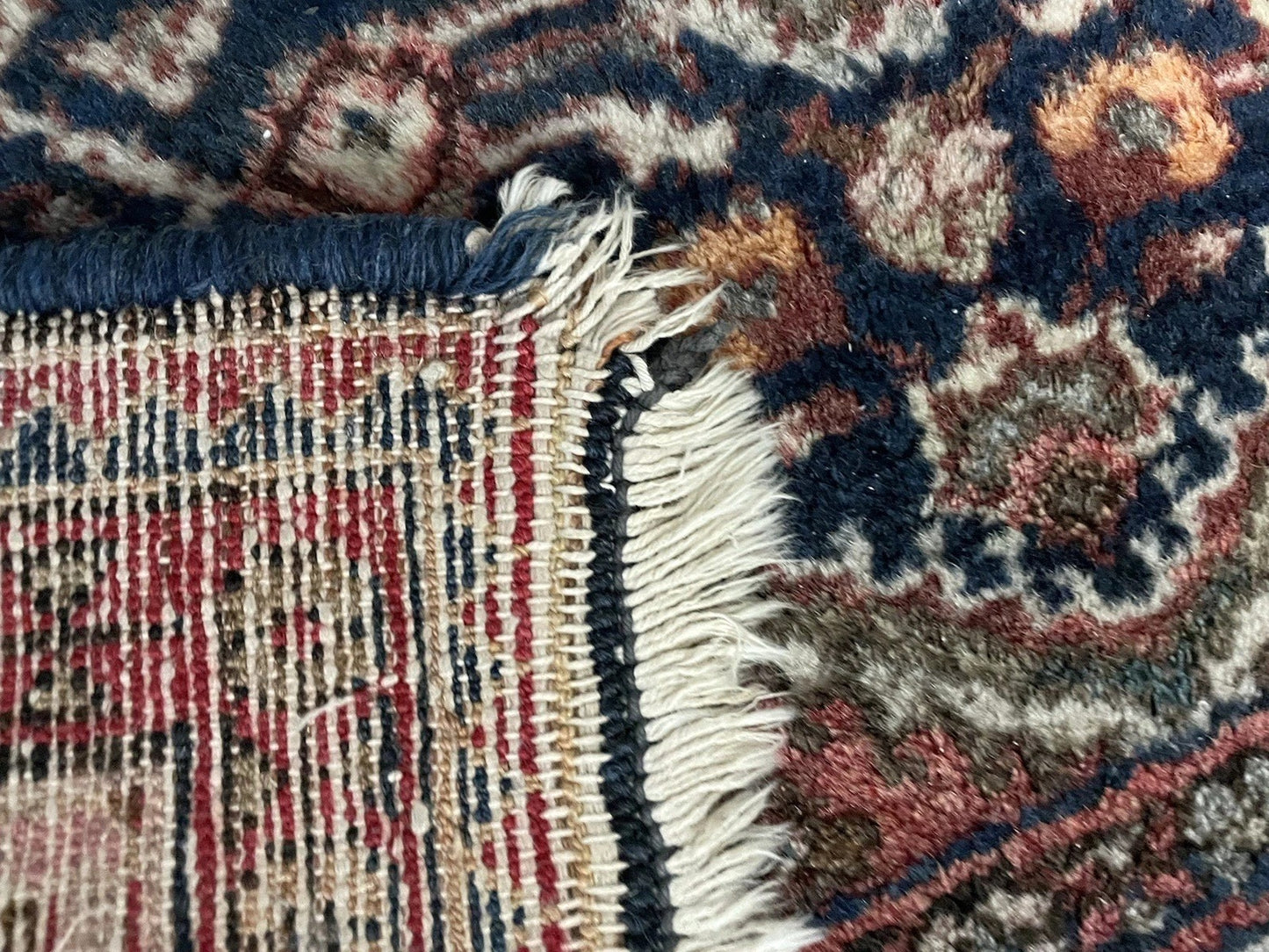 Worn texture and abrash in hand-knotted antique runner
