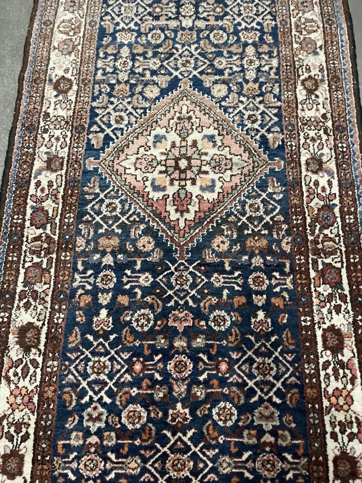 View of angular border motifs in Persian tribal rug