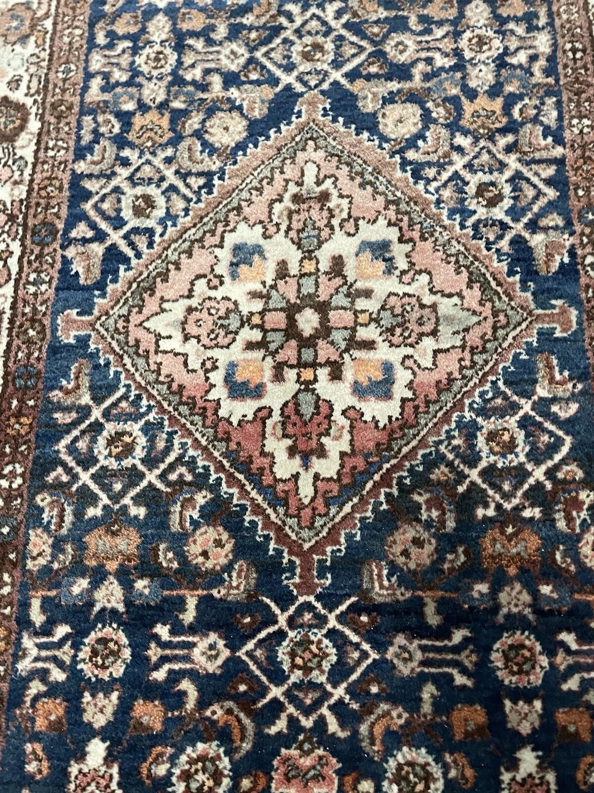 Long runner rug showing balanced geometric field