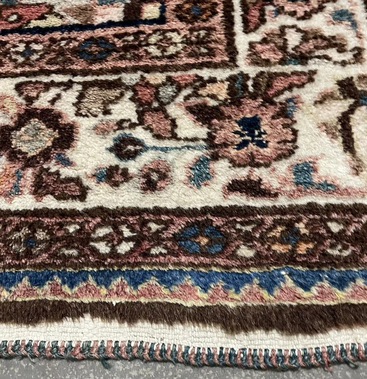 Tribal medallion design in madder red and camel tones