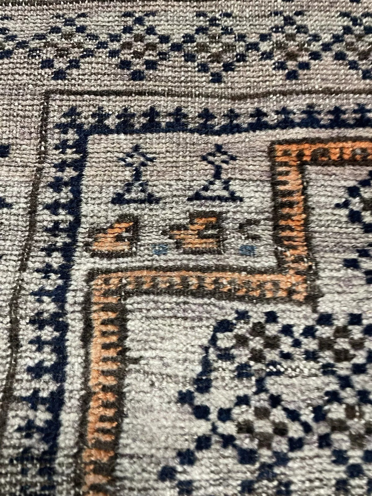 Rustic patina visible on antique Afghan nomadic rug