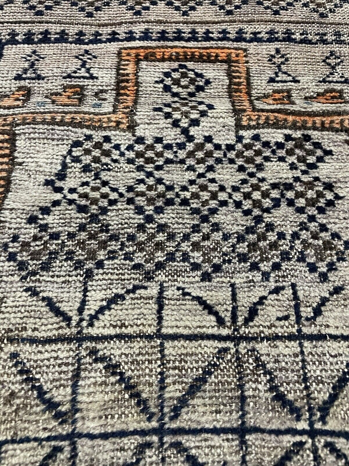 Central gul motif in rust-red decorative rug