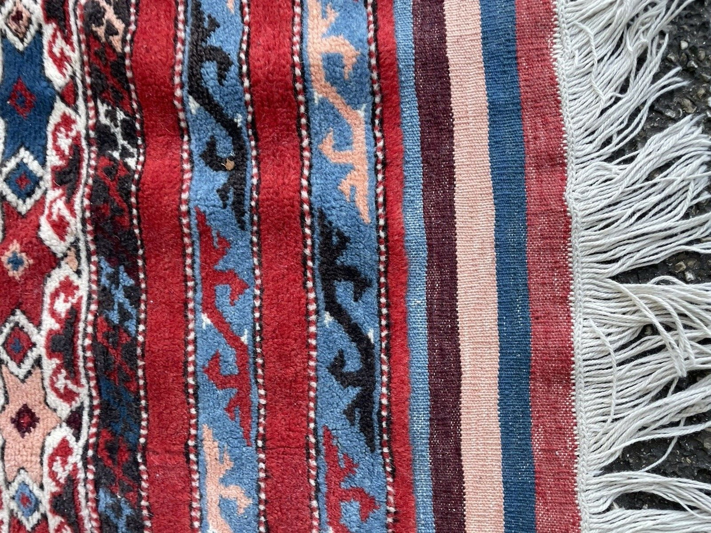 Tribal symbol cluster in muted cream and deep blue
