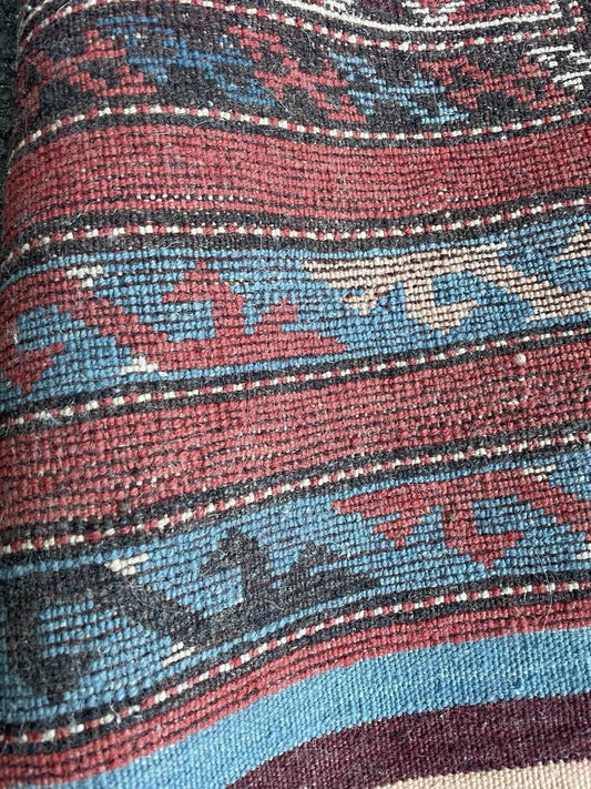 Close-up detail of dense wool pile in vibrant colors