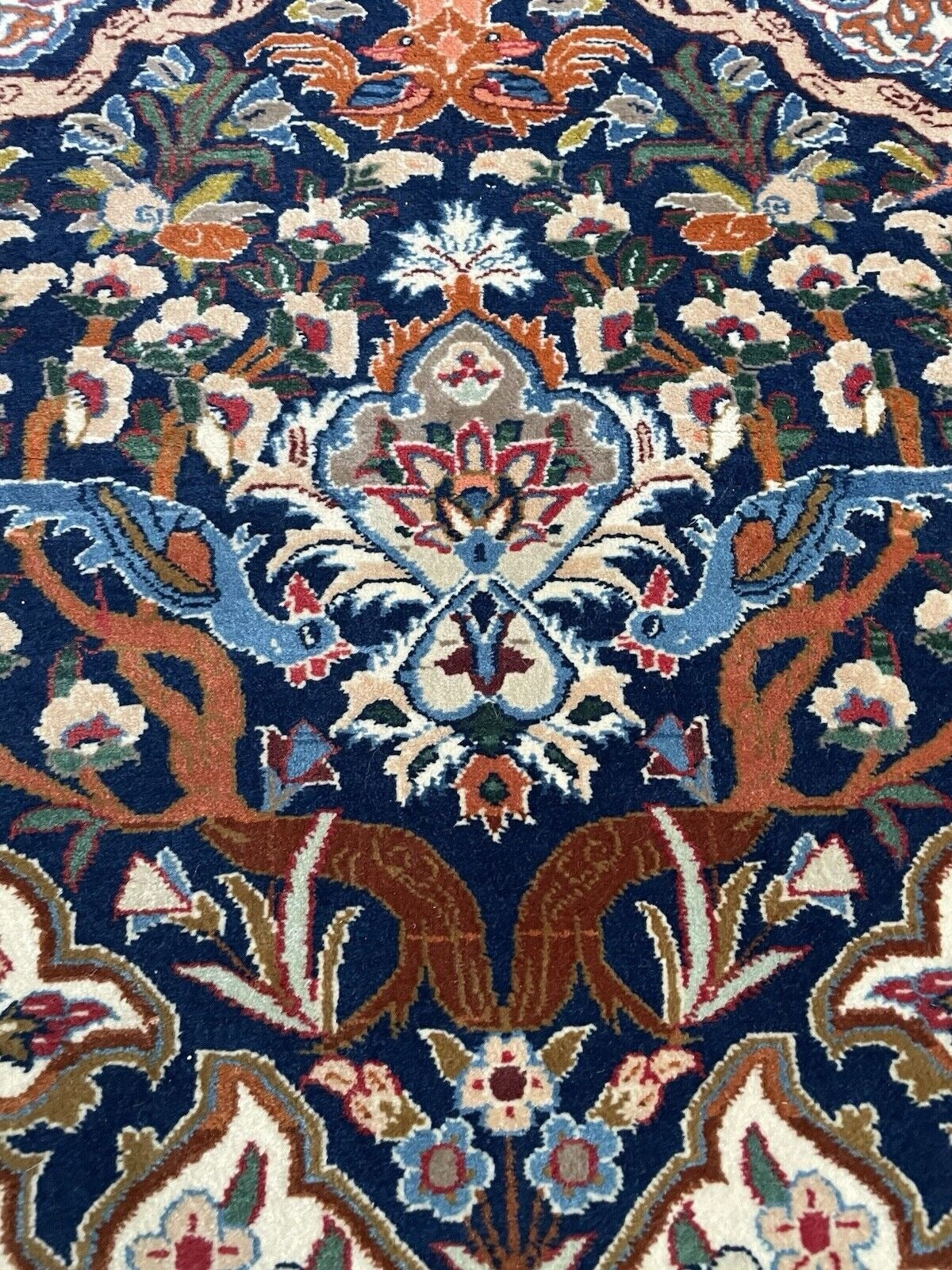 Detailed floral sprays woven with silk accents