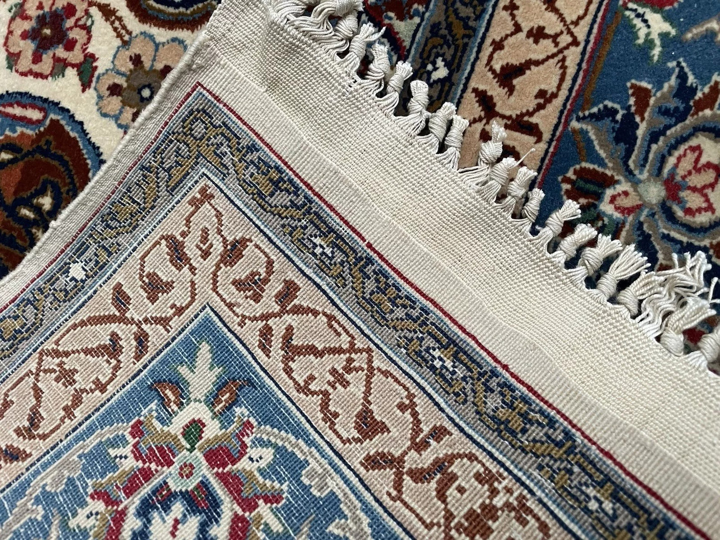 Fine Persian knot detail with rich color contrast