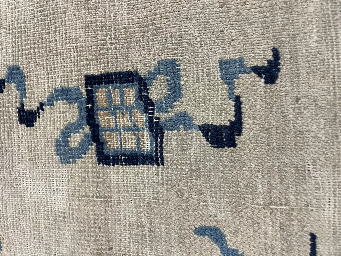 Gentle hand-knotted wool detail of Feti rug